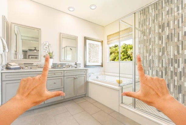 Design and Build Image of each hand with pointer and thumb extended on either side overlayed on top of an image of newly remodeled bathroom.