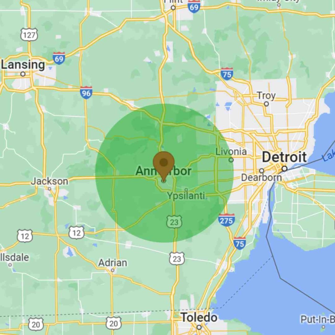 an image of a google map with a green transparent circle over Ann Arbor, Michigan with a radius of 20 miles