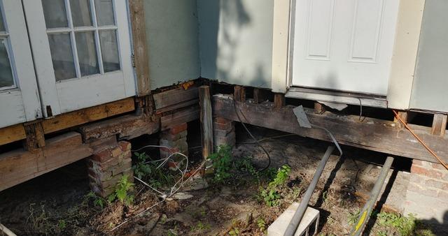 an image of a house in the middle of a foundation repair.