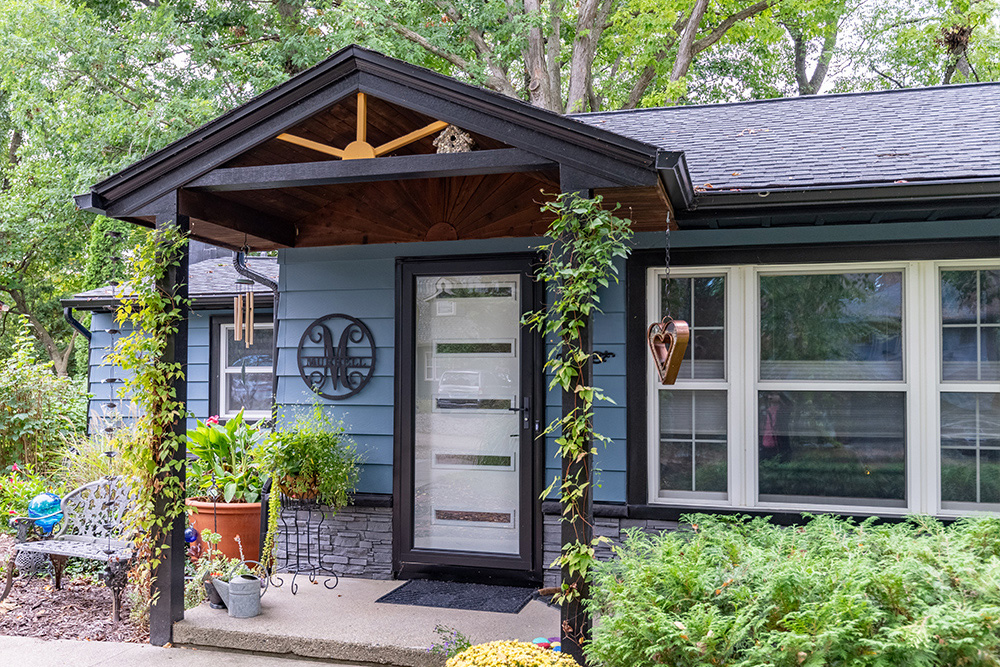 front door with landscaping